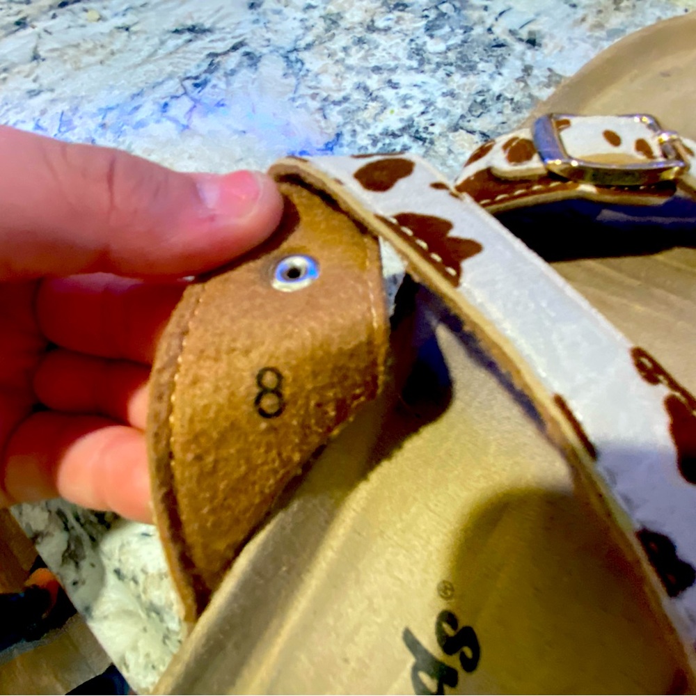 I am selling cow print outwoods Birkenstocks